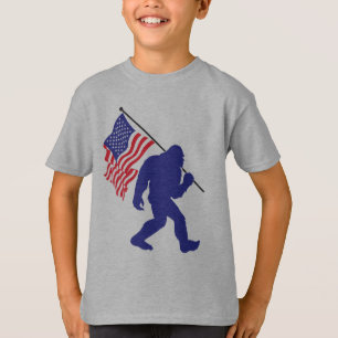 Bigfoot carrying a United States Flag T-Shirt