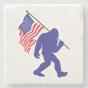 Bigfoot carrying an American Flag Stone Coaster