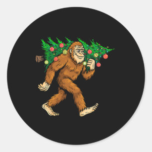 Bigfoot Carrying Christmas Tree Sasquatch Believer Classic Round Sticker