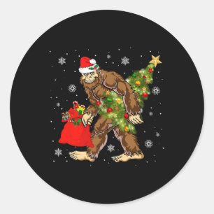 Bigfoot Carrying Christmas Tree Sasquatch Believer Classic Round Sticker