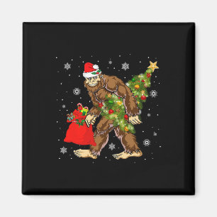 Bigfoot Carrying Christmas Tree Sasquatch Believer Magnet