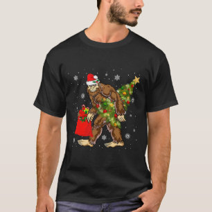 Bigfoot Carrying Christmas Tree Sasquatch Believer T-Shirt