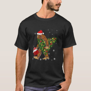 Bigfoot Carrying Christmas Tree Sasquatch Believer T-Shirt
