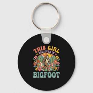 Bigfoot girl believes forest floral sunset key ring