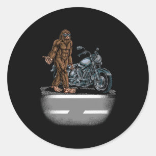 Bigfoot Riding A Motorcycle Bike Trying To Hitch A Classic Round Sticker