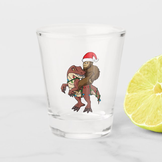 Bigfoot Riding Dinosaur Christmas Lights Shot Glass (Front)