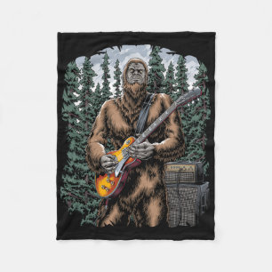 Bigfoot Rockin Out With His Guitar Out - Forest Ja Fleece Blanket
