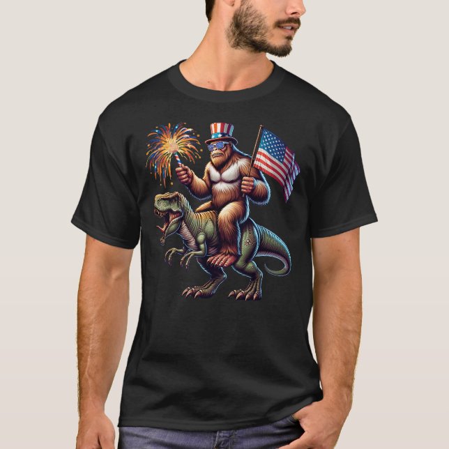 Bigfoot Sasquatch Riding Dinosaur T rex. Funny 4th T-Shirt (Front)