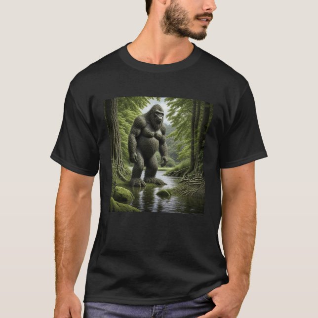 Bigfoot standing in a Creek Cartoon  T-Shirt (Front)