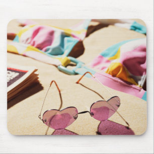 Bikini Top And Heart Shape Sunglasses On Beach Mouse Mat