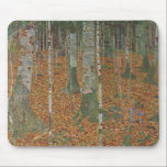 Birch Forest by Gustav Klimt, Vintage Art Nouveau Mouse Mat<br><div class="desc">Birch Forest (c. 1903) by Gustav Klimt is a vintage Victorian Era Symbolism fine art landscape painting featuring a nature scene. A forest with birch trees and leaves in the Autumn season with brown leaves scattered on the ground. About the artist: Gustav Klimt (1862-1918) was an Austrian Symbolist painter and...</div>