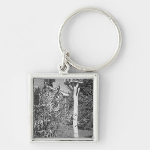 Bird house in garden key ring