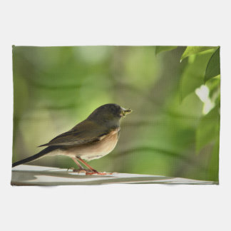 Bird in green leaves background tea towel