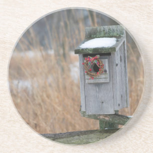 Bird, nest box with holiday wreath in winter coaster