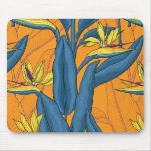 Bird of paradise flowers on orange mouse mat