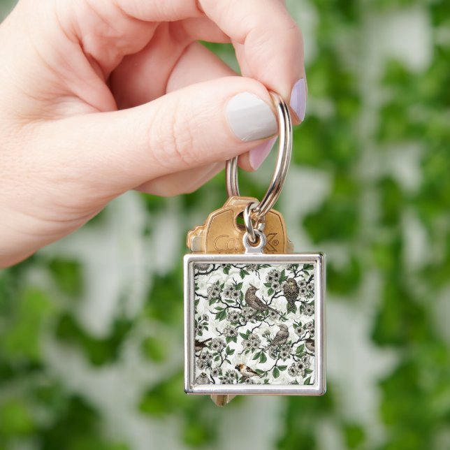 Birds and cherry blossom on white key ring (Hand)