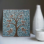 Birds and Tree of Life Muted Blue Art Nouveau Tile<br><div class="desc">Welcome to CreaTile! Here you will find handmade tile designs that I have personally crafted and vintage ceramic and porcelain clay tiles, whether stained or natural. I love to design tile and ceramic products, hoping to give you a way to transform your home into something you enjoy visiting again and...</div>