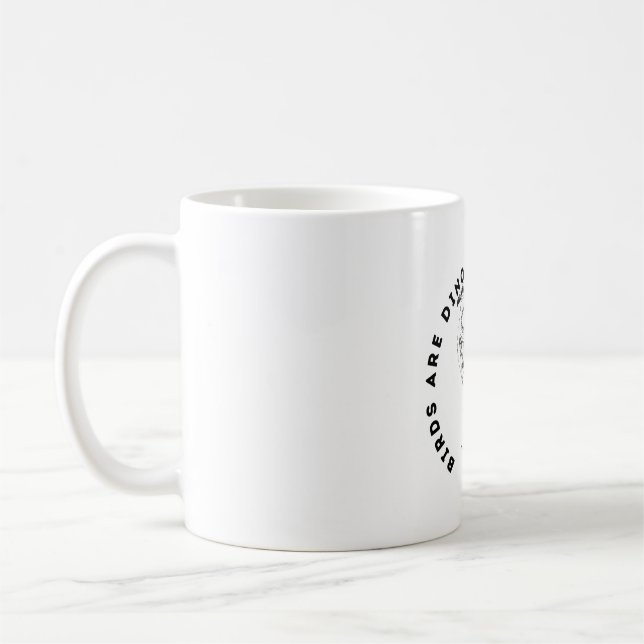 Birds are dinosaurs in disguise coffee mug (Left)