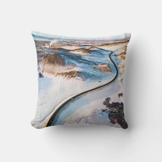 BIRD'S EYE PHOTOGRAPHY OF ROAD NEAR MOUNTAINS CUSHION