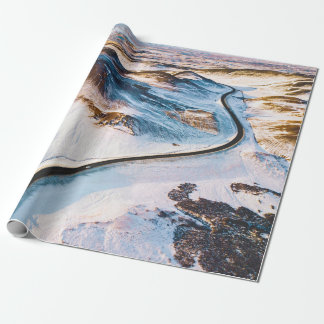 BIRD'S EYE PHOTOGRAPHY OF ROAD NEAR MOUNTAINS WRAPPING PAPER