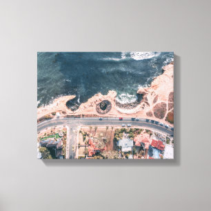 bird's eye view of sea and town canvas print