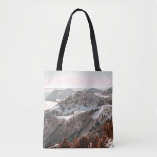 BIRD'S-EYE VIEW OF SNOW COVERED MOUNTAIN UNDER CLE TOTE BAG