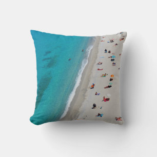 Bird's eye view photo of people on beach cushion