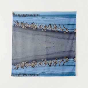 Birds flying near the Ocean Tapestry