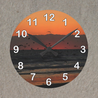 Birds Flying Over the Ocean Sunrise Photo Round Clock