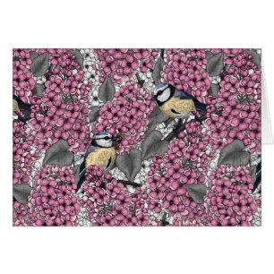 Birds in pink lilac garden