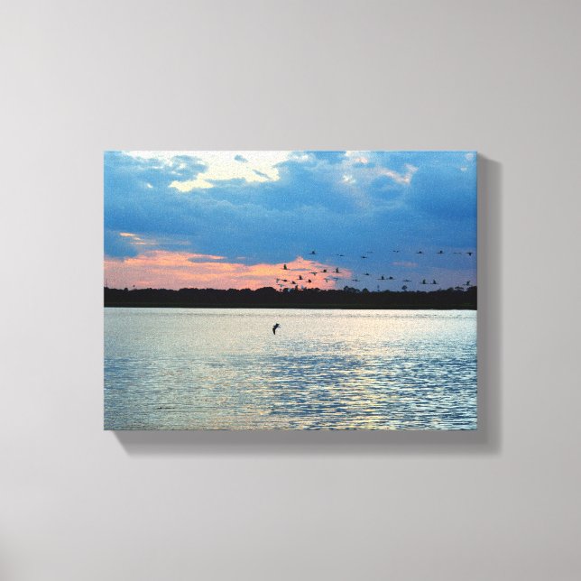 Birds migrating at sunset canvas print (Front)