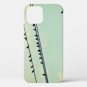 Birds on wires, vintage blue sky. iPhone 12 case