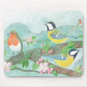 Birds sing on a blossoming tree branch in spring  mouse mat