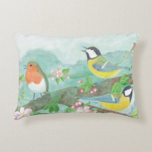 Birds singing on a blossoming tree branch decorative cushion