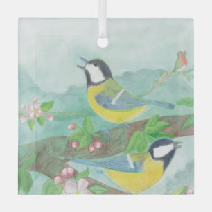 Birds singing on a blossoming tree branch  glass tree decoration