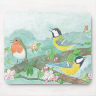 Birds singing on a blossoming tree branch  mouse mat
