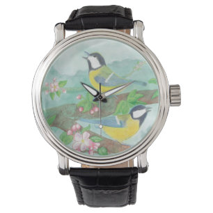 Birds singing on a blossoming tree branch  watch
