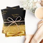 Birthday black gold glitter sparkle monogram name wrapping paper sheet<br><div class="desc">Elegant,  classic,  glamourous and feminine style party wrapping paper. A chic black background decorated with faux golden glitter and sparkle. With a golden bow and ribbon. With the text: Happy Birthday,  golden letters. Personalise and add a name.</div>