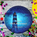 Birthday lighthouse navy blue night monogram paper plate<br><div class="desc">A lighthouse a stormy night with dark clouds and rain. A faint light can be seen in the lighthouse tower. A dark blue image covered with drops like raindrops or ocean spray. The lighthouse, a symbol of hope in the darkest of nights, guidance, direction and help. A safe Journey. Personalise...</div>