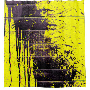 Black abstract splatter paint drips on a bright ye shower curtain
