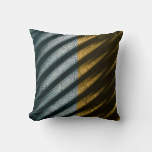 Black and brown striped textile cushion