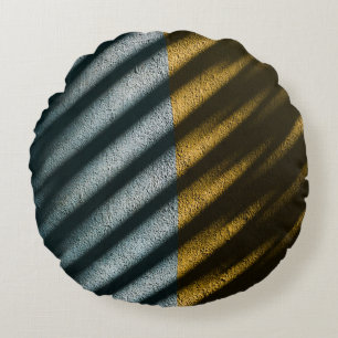 Black and brown striped textile round cushion