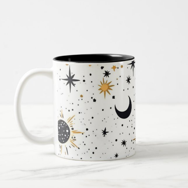 Black and Gold Celestial Sun Moon Stars Two-Tone Coffee Mug (Left)