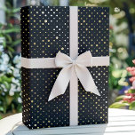 Black and Gold Foil Confetti Polka Dots Wrapping Paper<br><div class="desc">This elegant wrapping paper features a stunning black background adorned with shimmering gold foil confetti polka dots. Perfect for upscale events like weddings,  birthdays,  or holidays,  this design adds a luxurious and sophisticated touch to any gift.</div>