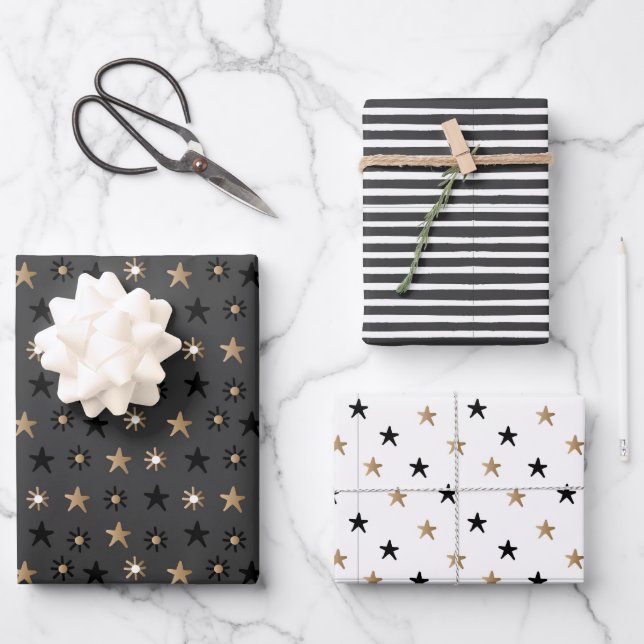 Black and Gold Scandinavian Stars and Stripes Xmas Wrapping Paper Sheet (Front)