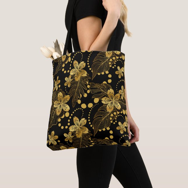 Black and gold Tropical leaves and flowers pattern Tote Bag (Close Up)