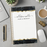 Black And Gold Watercolor Business Planner<br><div class="desc">Elevate your professional style with this black and gold watercolor business personalised planner. Perfect for women in the beauty industry, this planner combines elegant design with practical functionality. The luxurious gold accents and chic watercolor artwork add a touch of sophistication to your daily organisation. Personalise it with your name for...</div>