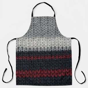 Black and grey knitting wool with red and white st apron