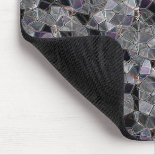 Black and grey mosaic with partially removed colou mouse mat