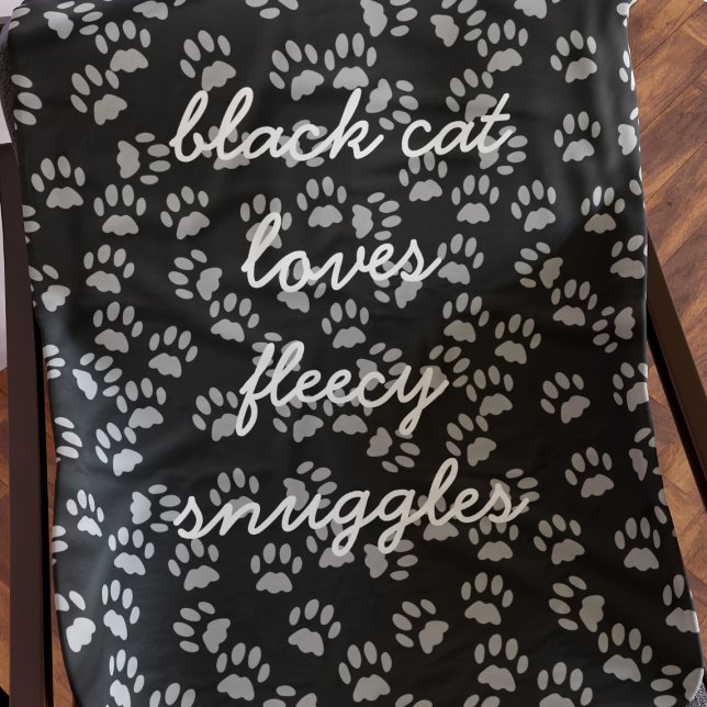 Black and Grey Paw Print Cat Name Fleece Blanket (Black cat loves fleecy snuggles any time of year. Add your text to this soft and warm fleece blanket)